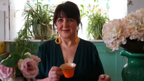 Lloyd Allen  Louise Allen pictured with a cup of tea