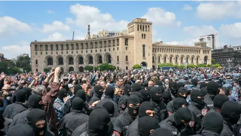 AFP Police hold off protesters in Yerevan, 2 April