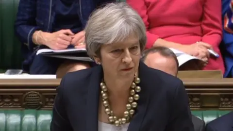 PA Theresa May