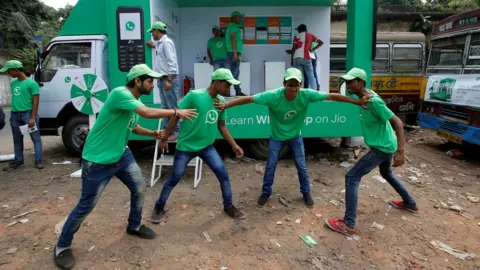 Reuters  Actors in WhatsApp shirts perform a skit in Jaipur in October 2018