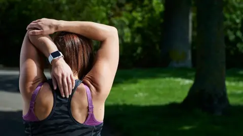 Getty Images woman wearing apple watch