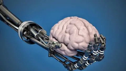 Thinkstock Robot hand holding brain