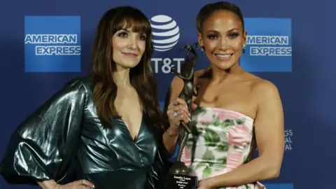 Reuters Jennifer Lopez with director Lorene Scafaria after receiving the Spotlight Award at the Palm Springs International Film Festival