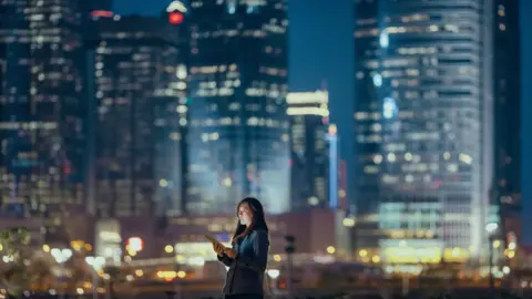 Getty Images Woman with computer