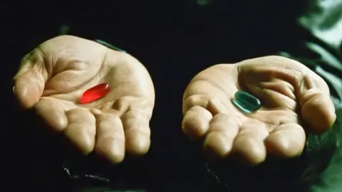 Alamy Morpheus offering Neo the red pill or blue pill