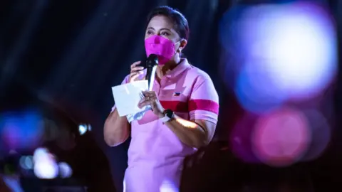 Getty Images Philippines vice president Leni Robredo addresses the crowd as workers, activists, and other sectoral groups gathered to mark International Labor Day and to show their support to her bid for presidency, on May 1, 2022 in Manila, Philippines.