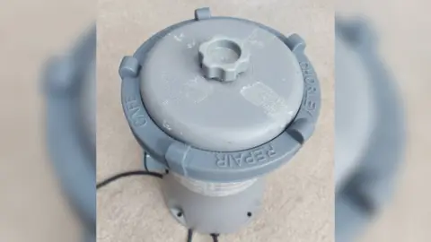 Print City A grey pool filter branded with the words "Chorley Repair Café."