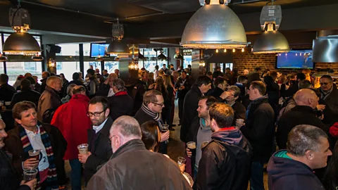 David Gee/Alamy Stock Photo New pubs were designed with characteristics like few tables and noisy surroundings, which encouraged people to drink more (Credit: David Gee/Alamy Stock Photo)
