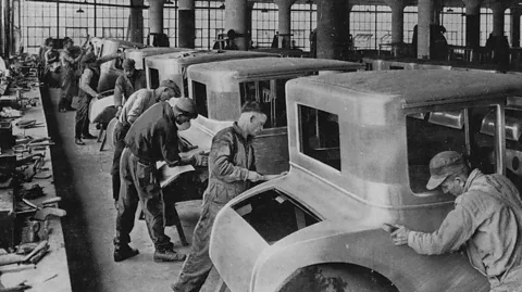 Getty Images The Ford Sociological Department was created to investigate and monitor the personal and work lives of employees (Credit: Getty Images)