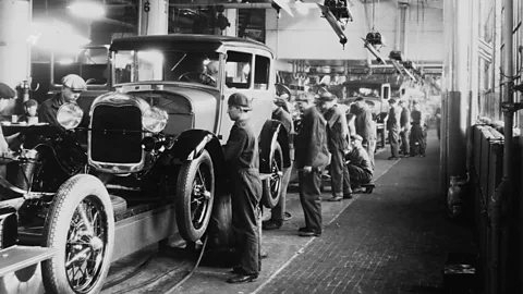 Getty Images Assembly line workers inside the Ford Motor Company factory at Dearborn, Michigan (Credit: Getty Images)