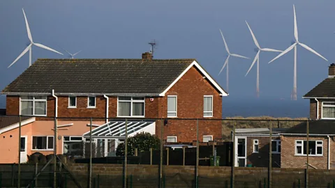 Alamy Many residents of East Anglia can watch wind turbines spinning from their homes (Credit: Alamy)
