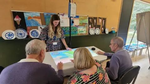 Hayley Coyle/BBC  dementia patients playing with the Happiness Programme 