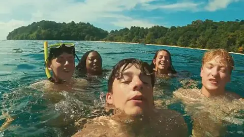 BBC/Studio Lambert Race Across the World teams swimming in the sea