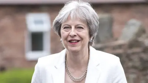 Reuters Theresa May