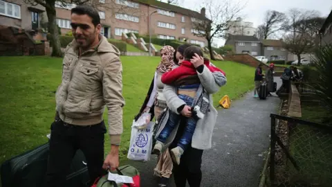 Getty Images Picture of Syrian refugees arriving in the Isle of Bute