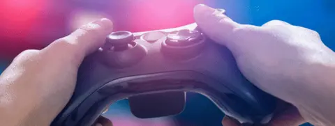 Getty Images A gaming console in hands