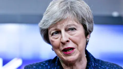 AFP Theresa May