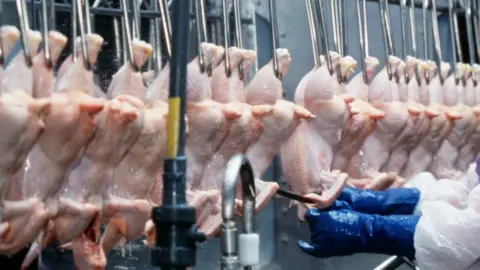 Getty Images Chicken being processed in Arkansas, US