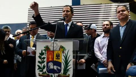 AFP Venezuelan opposition leader Juan Guaidó addresses a rally in Caracas on March 27, 2019