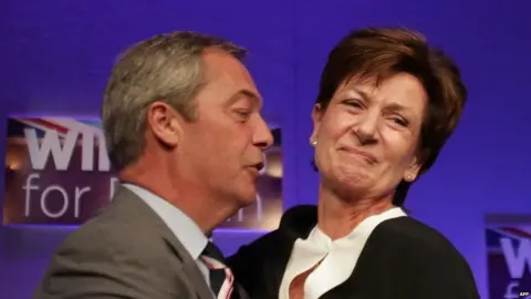 AFP Nigel Farage greets Diane James after she is elected leader in 2016