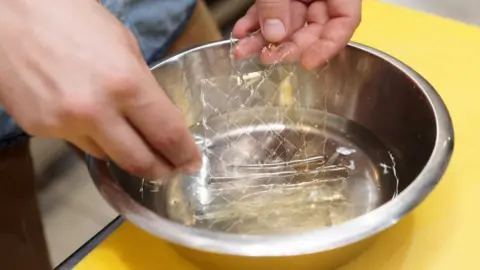 Getty Images Gelatin sheets being soaked in water