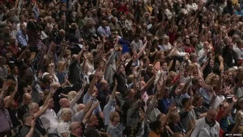 Getty Images Labour delegates voting in Brighton