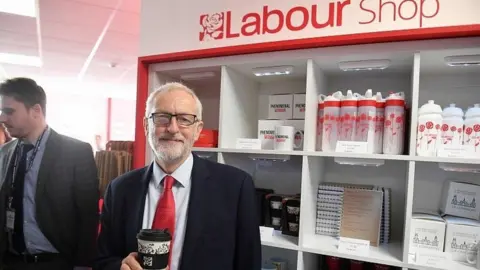 AFP Jeremy Corbyn at end of the Labour conference stalls