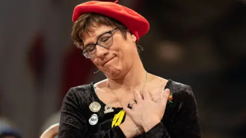 Getty Images Annegret Kramp-Karrenbauer, leader of Germany's conservative Christian Democratic Union (CDU), as she performs during a carnival convention in Staufen, southern Germany