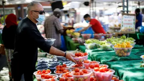 Getty Images Market trader