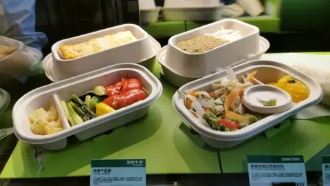Getty Images Plant-based meat dishes are seen offered at a Starbucks store on April 22, 2020 in Shanghai, China. Starbucks has launched plant-based meat menus in China