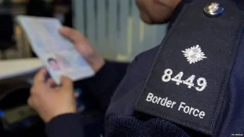 PA Media Border Force official at Heathrow