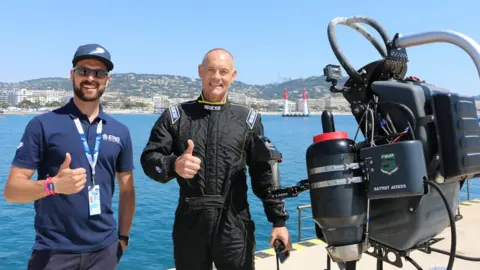 JetPack Aviation David Mayman, right, and a colleague