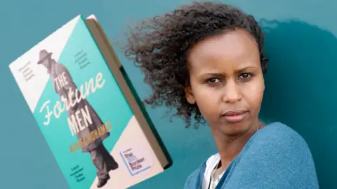 Getty Images/PA Nadifa Mohamed and her book The Fortune Men