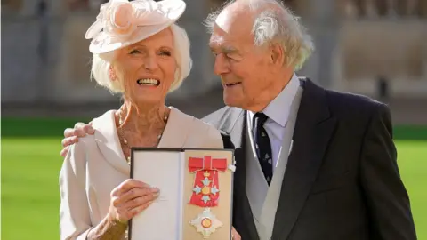 PA Media Mary Berry with husband Paul Hunnings