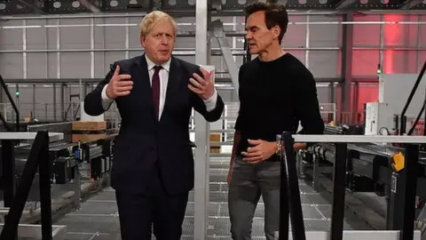 Getty Images Hut Group founder Matthew Moulding and Prime Minister Boris Johnson