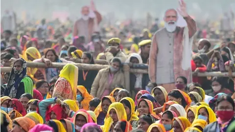 Getty Images Women at a rally by PM Modi in Allahabad in December 2021