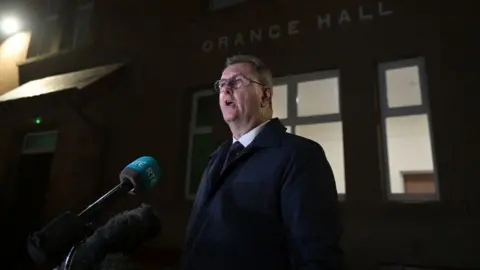 Getty/Charles McQuillan DUP leader Sir Jeffrey Donaldson speaks to the media before attending an Anti-NI Protocol rally at Dromore Orange Hall
