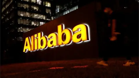 Reuters File photo of a logo of Alibaba Group at its office building in Beijing, China August 9, 2021