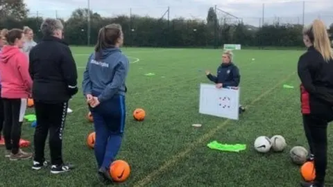 Abbie Sadler Abbie teaching other women