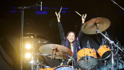 carlet Page/MBC/PA Wire Nandi Bushell performs at Wembley in concert for Foo Fighters drummer Taylor Hawkins