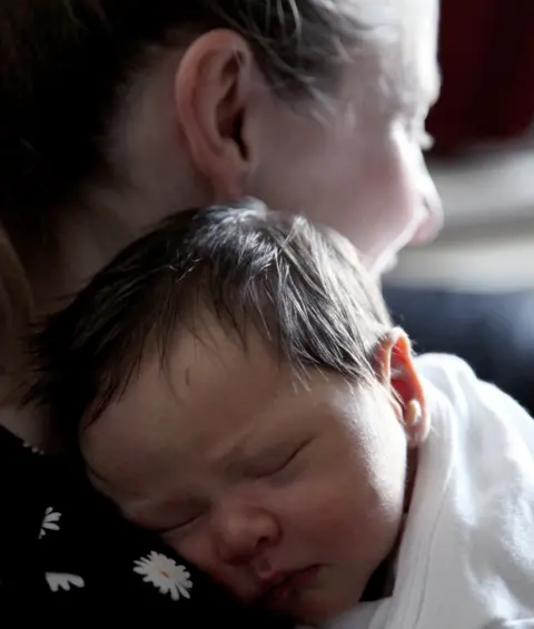 Helen Mary Inages  Lora Fachie with baby