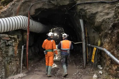 Scotgold Resources Workers at entrance to the mine at Cononish