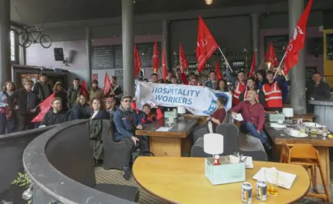 Unite Hospitality 13th note union protest