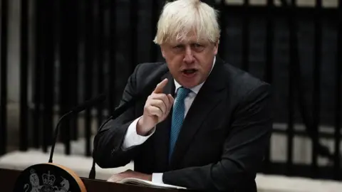 PA Media Boris Johnson makes a speech outside No 10 Downing Street before he formally resigns as prime minister