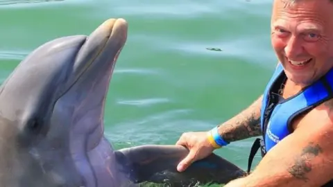 Alan Stevens Alan Stevens and dolphin