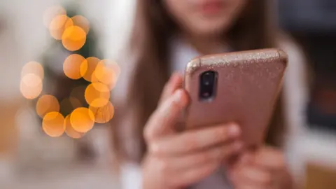 Getty Images Primary school child on smart phone