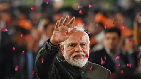 Getty Images Prime Minister Narendra Modi greets the supporters during celebrations after party's victory in elections to the Legislative Assemblies of Madhya Pradesh, Rajasthan and Chhattisgarh, at BJP headquarters,at BJP Headquarters on December 3, 2023 in New Delhi, India.