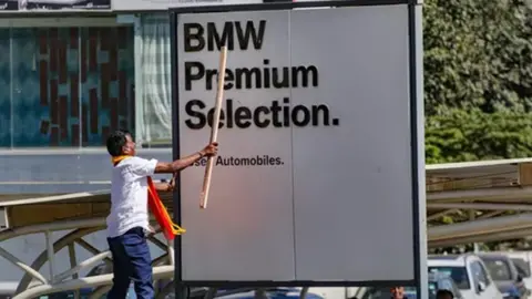 PTI A Kannada activist at a protest against English billboards in December 2023