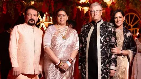 Reuters Paula Hurd, Bill Gates, Smriti Irani, India's Minister for Women & Child Development, and her husband Zubin Irani, pose during the pre-wedding celebrations of Anant Ambani, son of Mukesh Ambani, the Chairman of Reliance Industries, and Radhika Merchant, daughter of industrialist Viren Merchant, in Jamnagar, Gujarat, India, March 2, 2024.