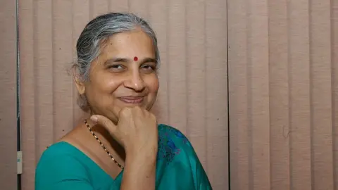 Getty Images Sudha Murthy at her house in Bangalore, India